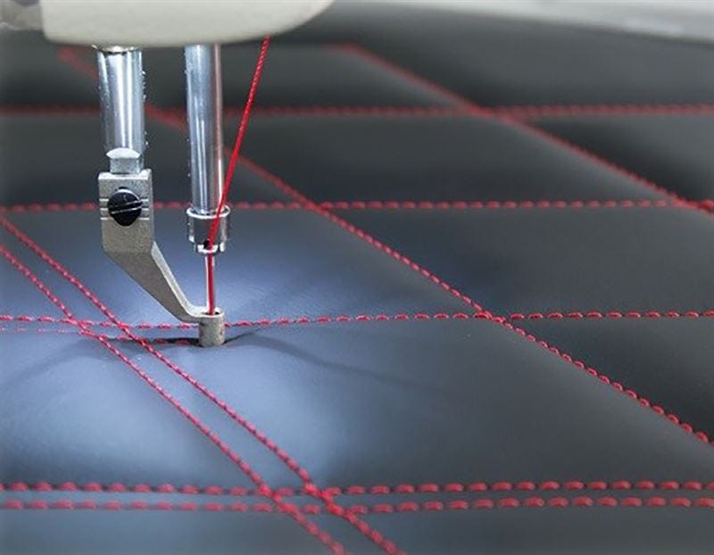 Coloreel partners Juki America for on-demand thread dyeing