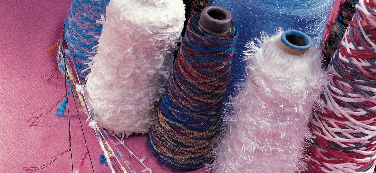 Fancy yarns weaving value in fashion, function and global trade.